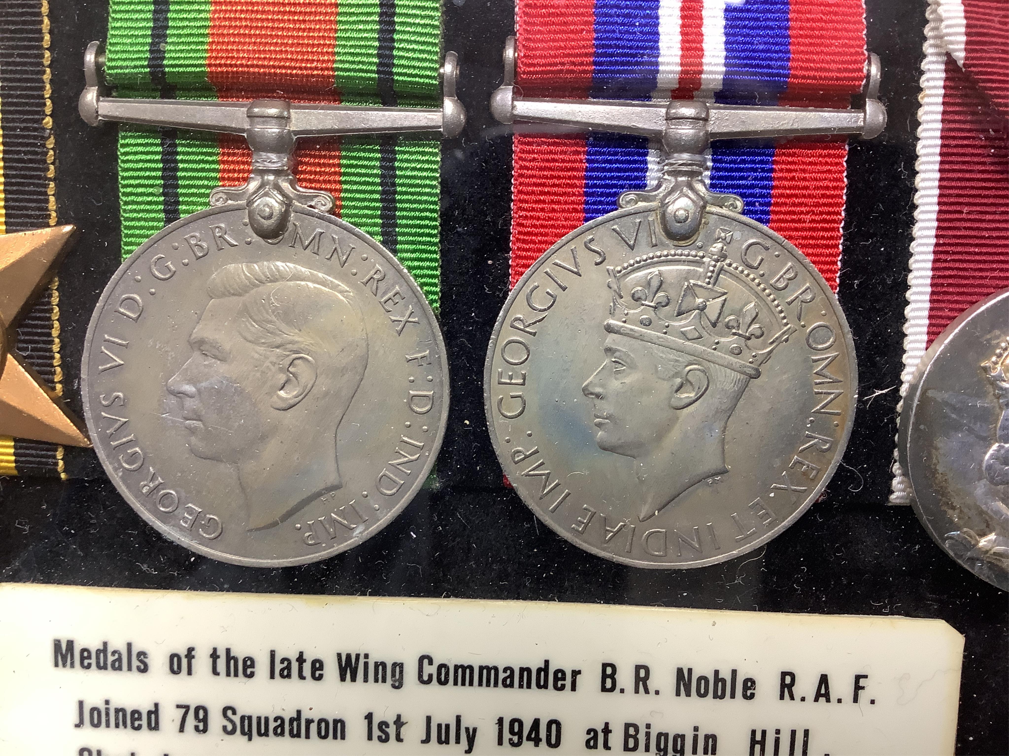 A framed WWII RAF medal group awarded to Wing Commander Brian Robert Noble, comprising;, The 1939-1945 Star, with clasp for the Battle of Britain, The Air Crew Europe Star, The Defence Medal, The British War Medal, The 1